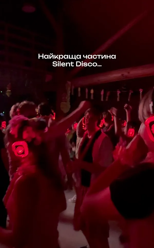 Guests dancing in red light